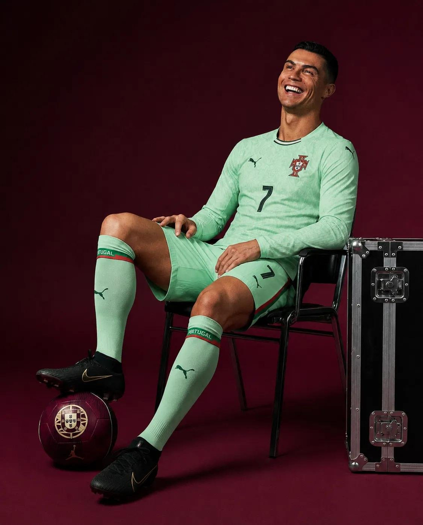 Portugal Number 7 Luxury Sports Editorial — Ultra-photorealistic luxury sports editorial, legendary football icon wearing a mint-green Portugal national team lo