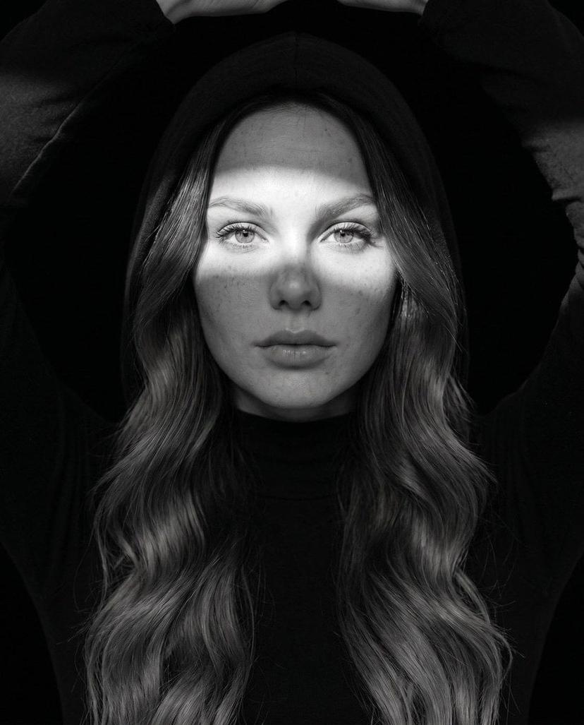 Fine Art Monochrome Fashion Portrait — Ultra-realistic fine art black-and-white portrait, editorial fashion photography, close-up centered composition, direct e