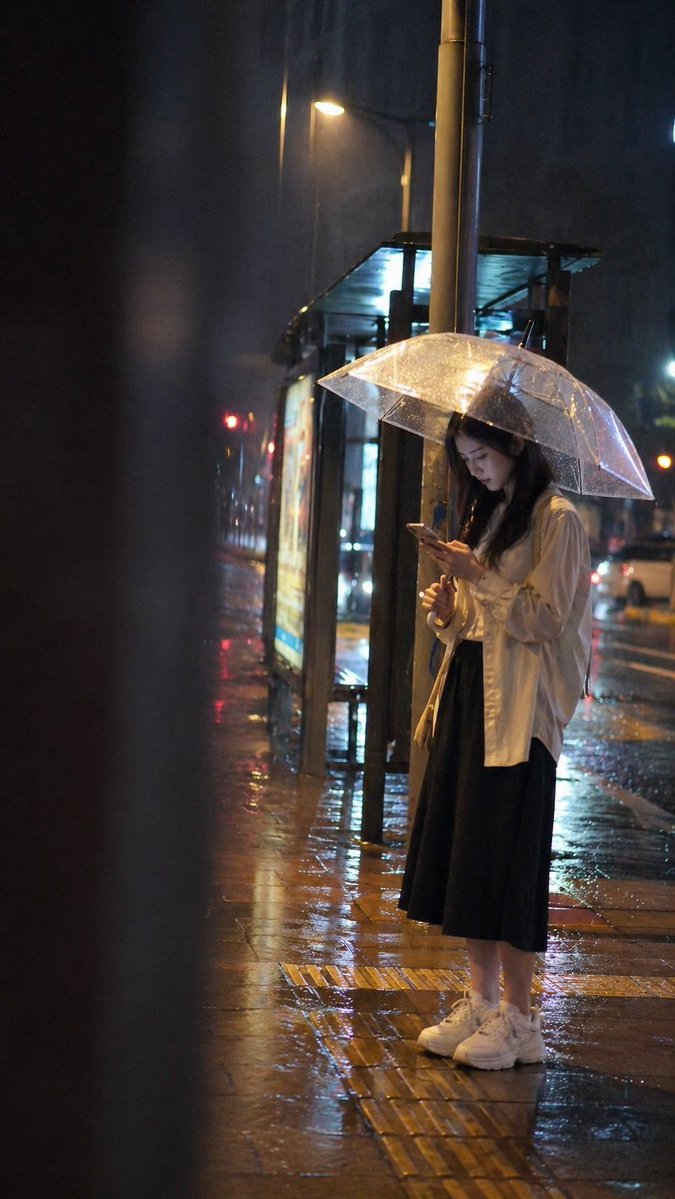 Cinematic rainy night bus stop prompt - AI image template preview