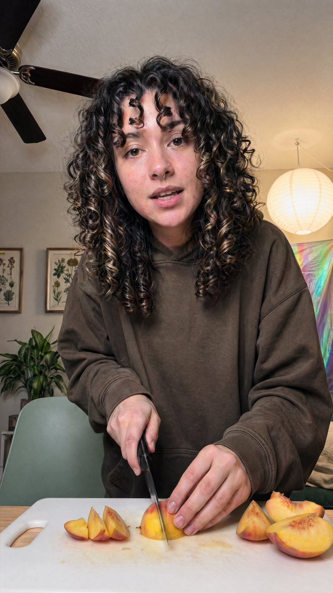 Cozy Indoor Peach Slicing Portrait - AI image template preview