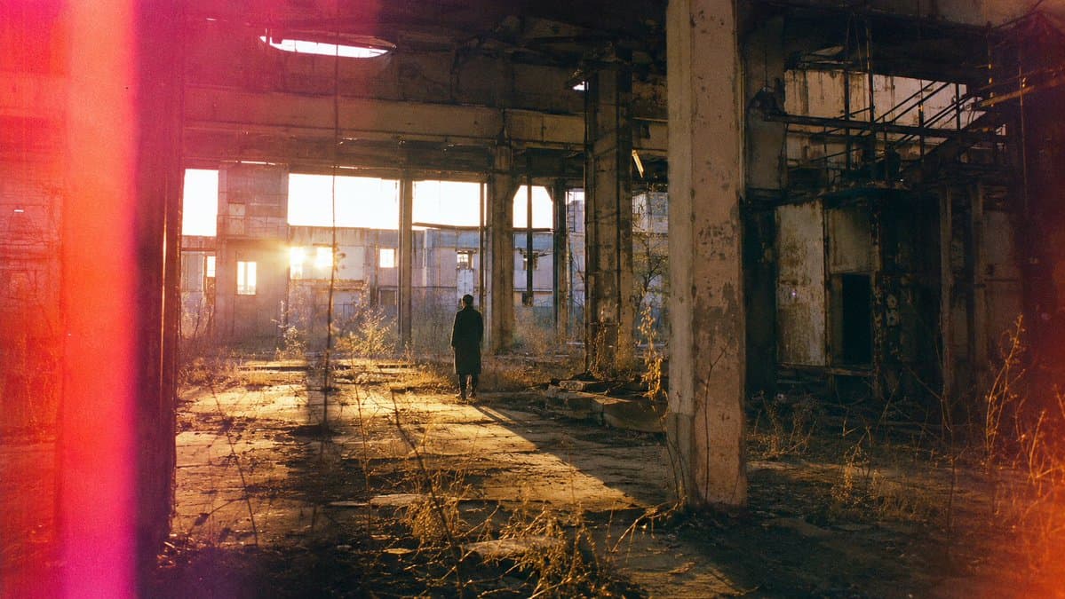 Lone Figure in Abandoned Warehouse - AI image template preview