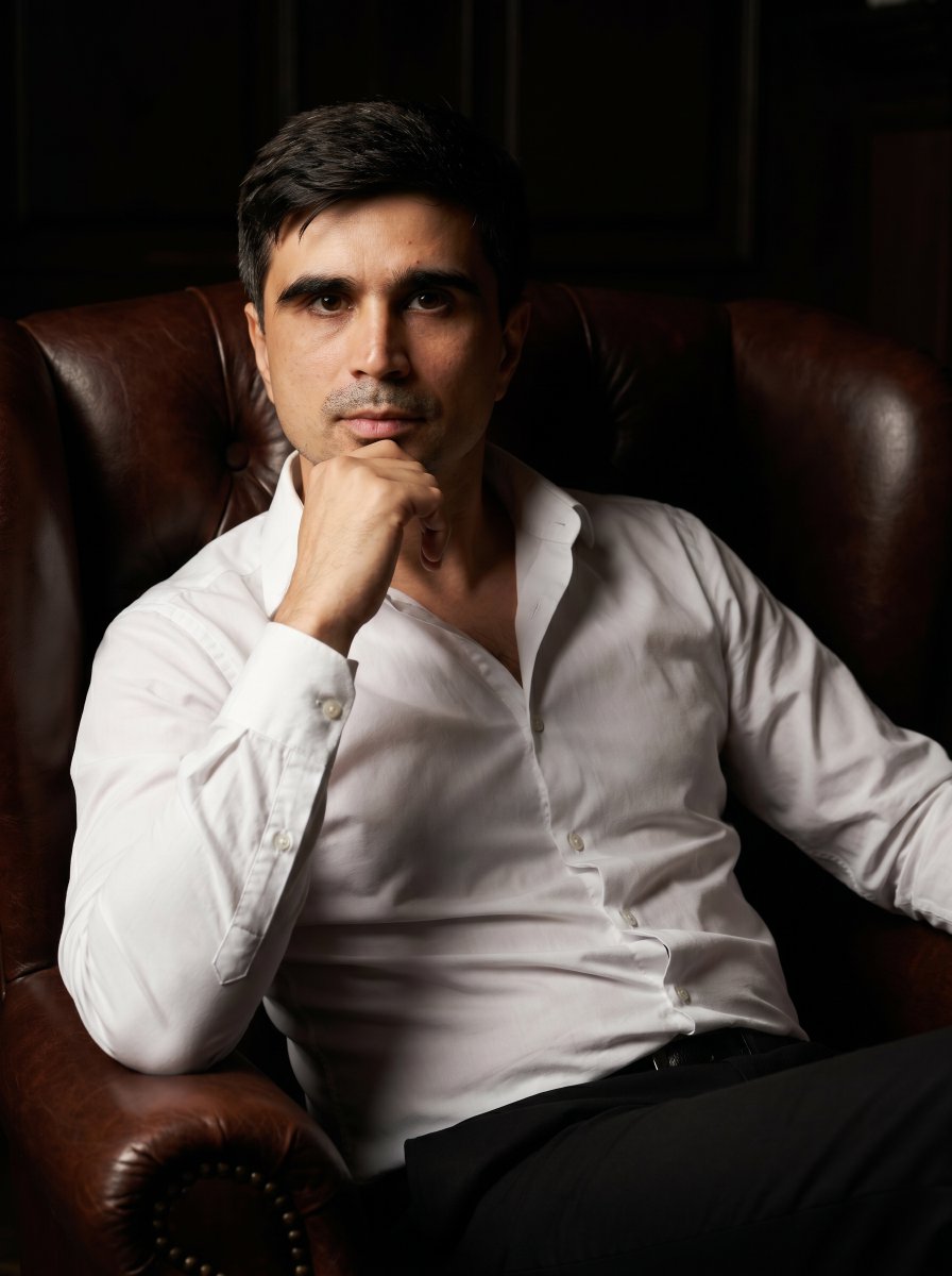 Professional Executive Portrait in Armchair - AI image template preview