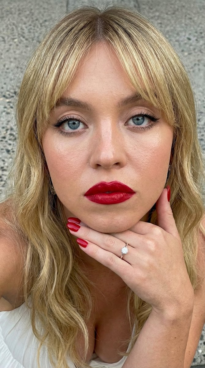 Close-up Portrait Prompt with Downward Gaze preview