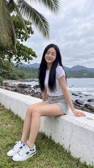 East Asian Woman on Seawall preview