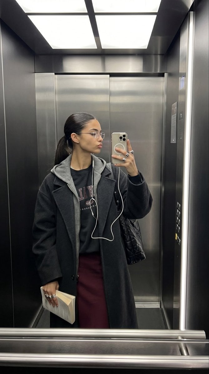 Elevator Mirror Selfie with Book preview
